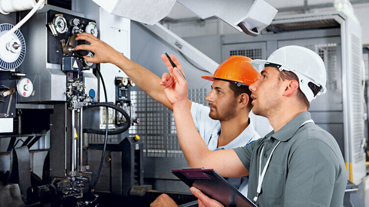 Men checking Machinery Safety