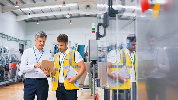 Men discussing Machinery Safety